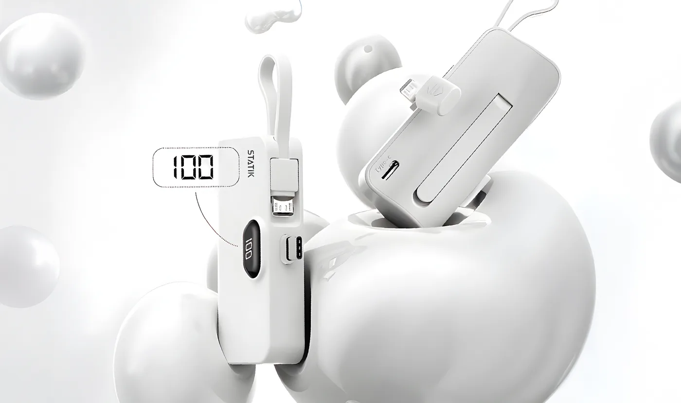 White Snap-N-Charge showing the 100 battery readout and the tucked recharge cable